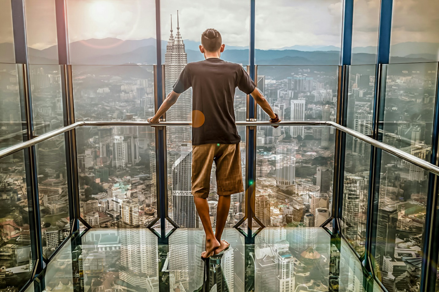 Mortgage Broker Looking Outside Through a Glass Window